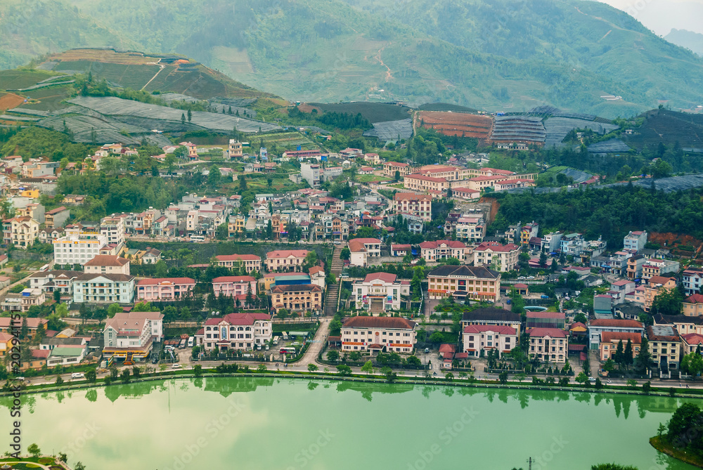 Wall mural aerial view of landmark landscape at the hill town in sapa city with the sunny light, vietnam