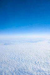 Fototapeta na wymiar clouds from airplane window