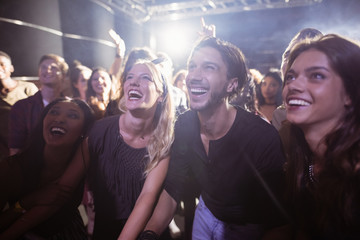 Cheerful people enjoying at nightclub