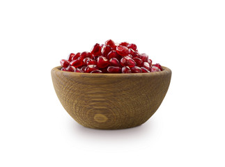 bowl with pomegranate seeds isolated on white background. Ripe pomegranates close-up. Sweet and juicy garnet with copy space for text.