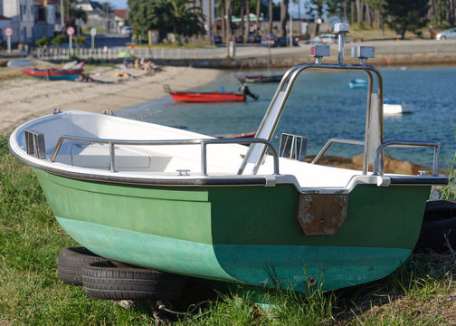 wooden fishing boat on the coast