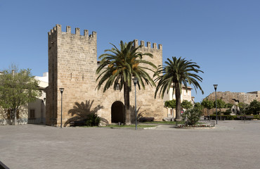 Fototapeta na wymiar Alcudia, Mallorca, Balearic Island, Spain. 2018. The Porta del Moll or Porta de Xara as it is known. A gate in the medieval wall in the old quarter of Alcudia.
