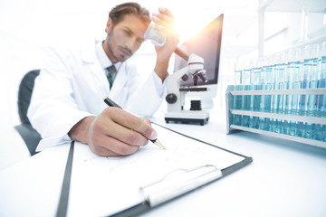 Fototapeta na wymiar scientist analyzing an experiment in a laboratory