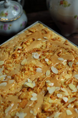 Cake with carmel and almond flakes