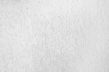 White stucco texture on the wall.  Plaster texture.