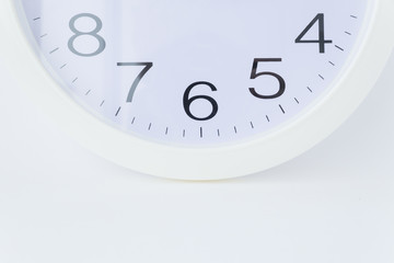 Part of a round clock on a white background.