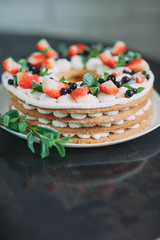 fruit cake with strawberries mint and blueberry