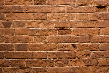 texture of a wall from an old red brick. ancient buildings, architecture.
