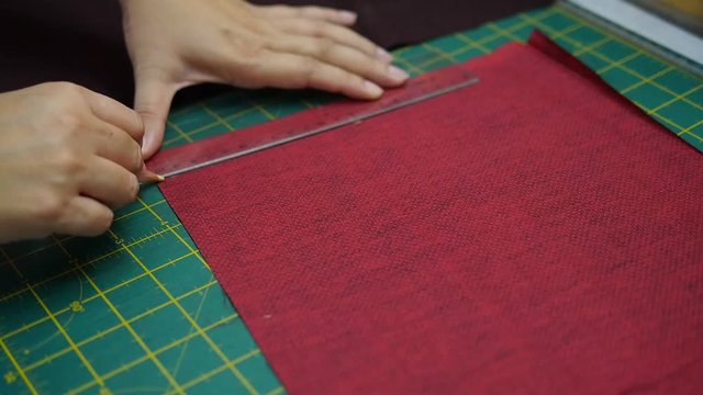 Woman's hands, doing her patchwork