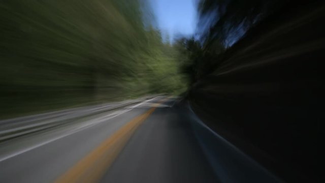 High-speed driver's POV of winding Highway 199 near the CA-OR border