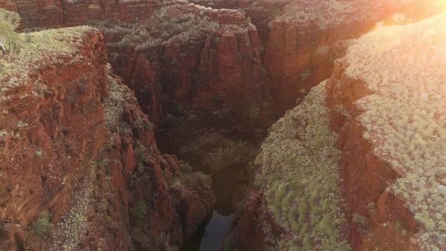 Flying over gorge in Karijini as the sun rises viewing the canyon where Hancock, Weano, and Joffre Gorge all come together.