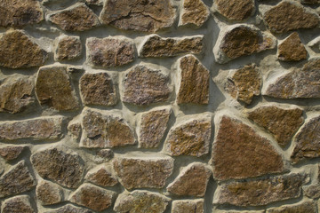 Texture of an old stone wall close-up