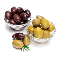 green and black olives isolated in glass bowl on white background