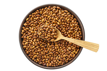 brown beans in a plate isolated