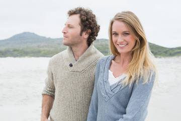 Happy casual young couple at beach