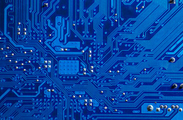 blue circuit board background of computer motherboard