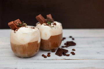 Iced Mocha Frappe Coffee with Whip Cream, Summer Drinking times. Coffee Beans. rustic textured...