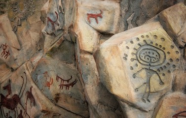 Fototapeta na wymiar Petroglyps on the stone