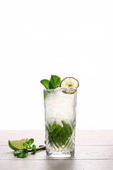 mojito cocktail isolated with mint and lime