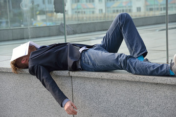 dismissed employee sleeps on the street