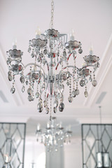 Elements of interior. Stylish chandelier. Close-up