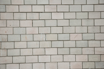 Textured background. White brick wall