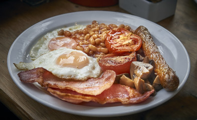 Classic English cooked Breakfast on a white plate