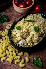 Macaroni and cheese set on dinner table.