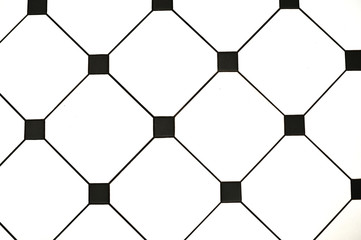 Elements of interior. Stylish black and white tiles. Close-up
