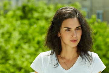 Fototapeta premium Portrait of young hispanic woman outdoor