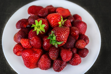 ripe berry strawberry clouse-up for the background.