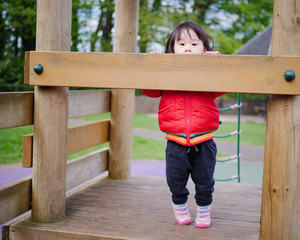 Baby girl play at outdoor playground