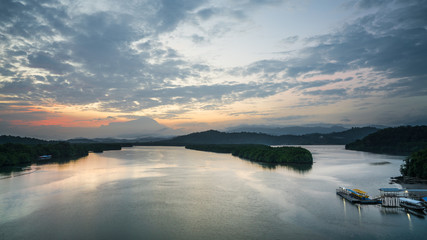 Fototapeta premium Vew of Mengkabong river and Mt Kinabalu from Mengkabong bridge.