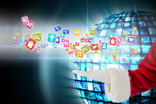 Santa claus presenting with hand against sphere of digital screens in blue