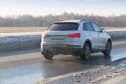 Car Moves On Wet Country Road.