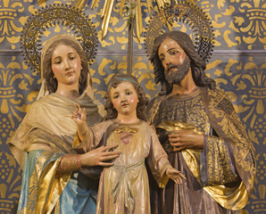ZARAGOZA, SPAIN - MARCH 3, 2018: The carved polychrome sculpture of Holy Family in church Iglesia de San Miguel de los Navarros form 19, cent. © Renáta Sedmáková