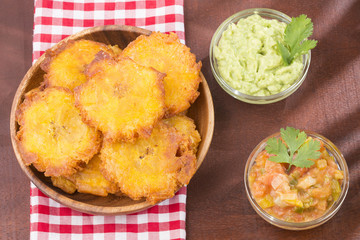 Patacón fried flattened pieces of green plantain (tostón, tachino)