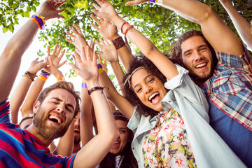 Happy hipsters dancing to the music