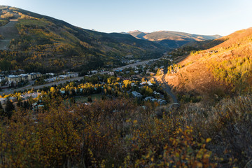 Landscape view of Vail Valley, Colorado during sunrise in autumn.. 