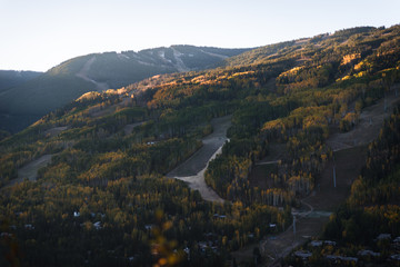 Fototapeta na wymiar Vail Colorado lit up during sunrise in autumn. 