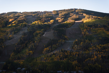 Vail Colorado lit up during sunrise in autumn. 