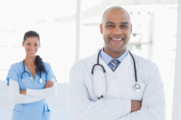 Fototapeta premium Smiling doctors looking at camera