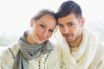 Close up portrait of a loving couple in winter clothing