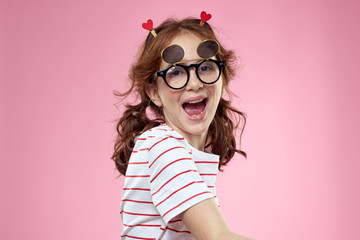 funny little girl with glasses