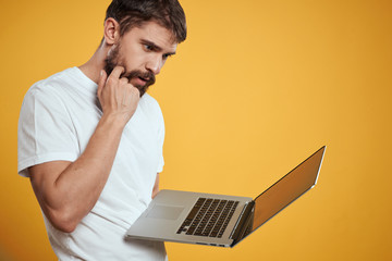 young man working on laptop