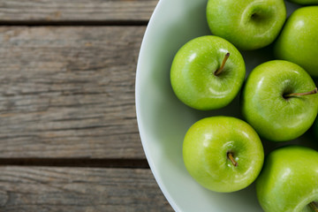 Close-up of green apples in bowl