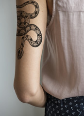 Closeup of arm tattoo of a woman