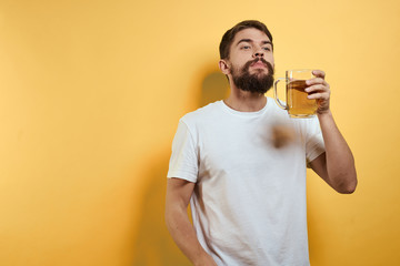 man with glass of beer