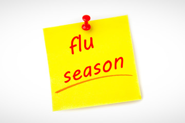 flu season against pinned adhesive note
