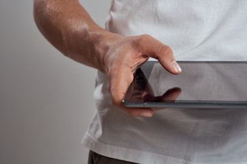 man using digital tablet